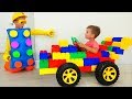 Vlad and nikita ride on toy sports car  play with colored toy blocks