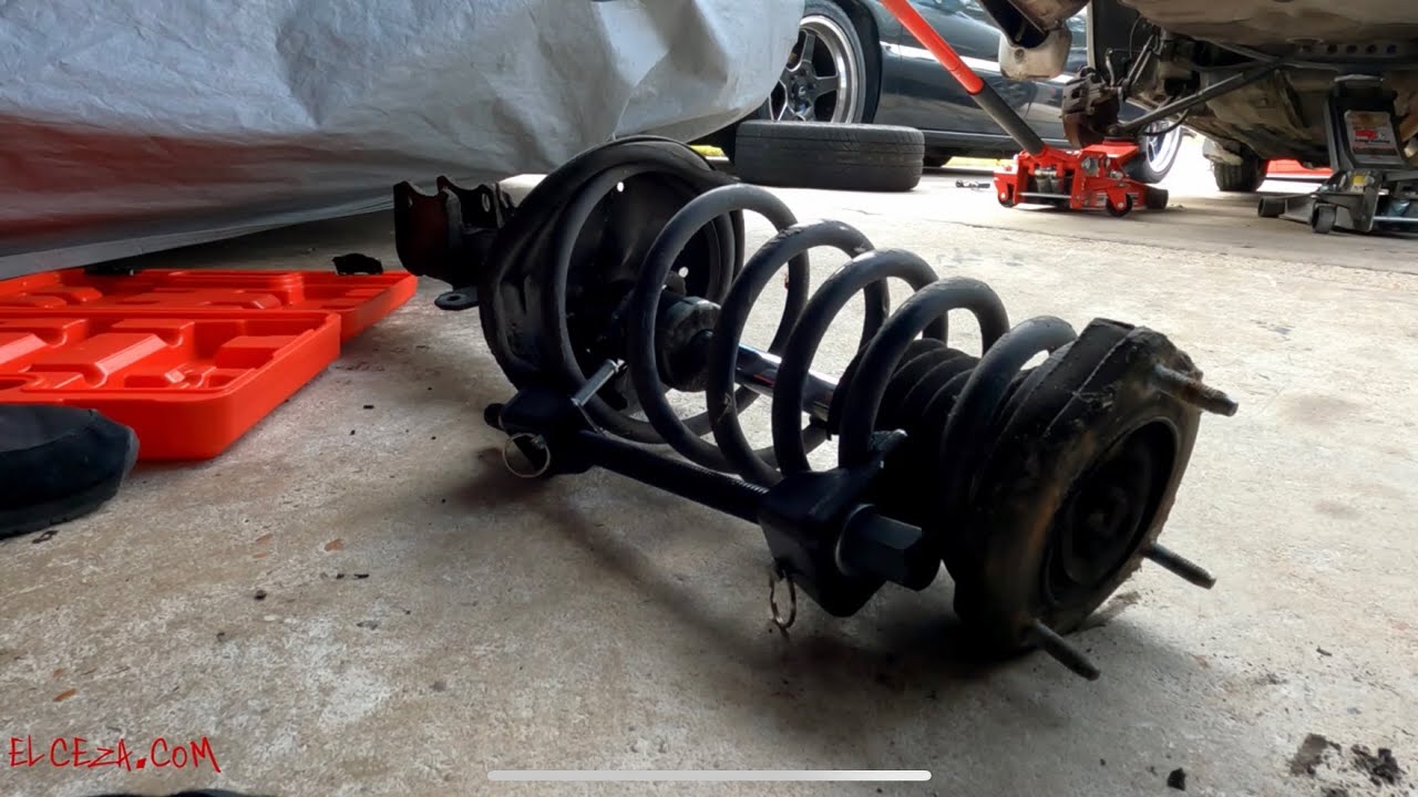 How to Replace Rear Struts on 1997-2003 Toyota Avalon Camry Solar V6 ...