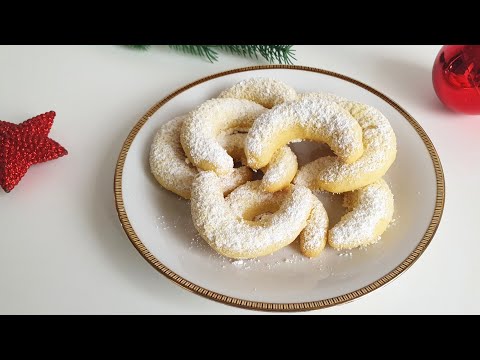 Vanillekipferl, einfach und lecker! 190 g Mehl 50 g gemahlene Mandeln 120 g Zucker 1 Päckchen Vanill. 