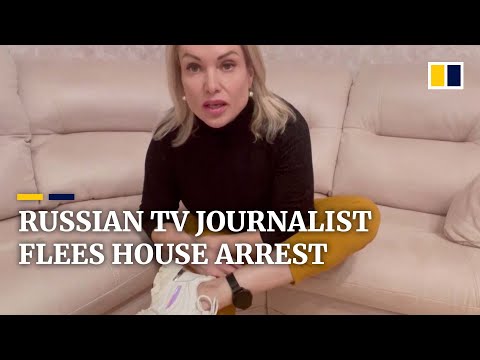 Russian TV journalist escapes house arrest after on-air protest