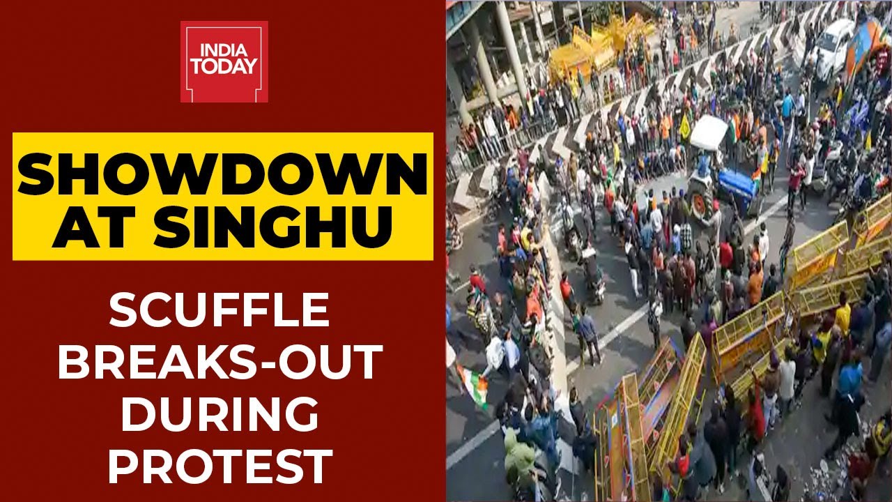 Showdown At Singhu: Scuffle Breaks Out, Police Fire Tear Gas Shells To Control Situation