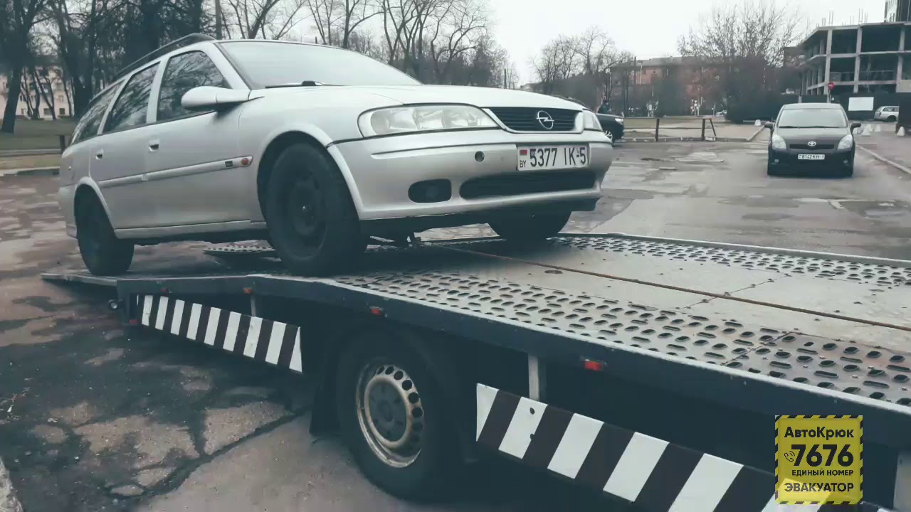 Погрузка машины на эвакуатор