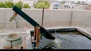 water Powered Pounder Corn Mill live