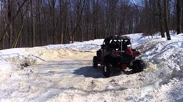 2014 Polaris rzr 900xp Black Stealth doing donuts on the ice!