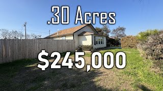 HOUSE WITH LARGE LAND .30 acres
