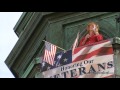 Hall County Supervisor Pam Lancaster sings from top of Hall County Courthouse to honor veterans