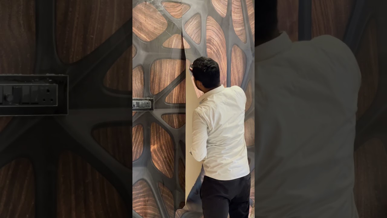 Amzing interior look with Black with wood wallpaper