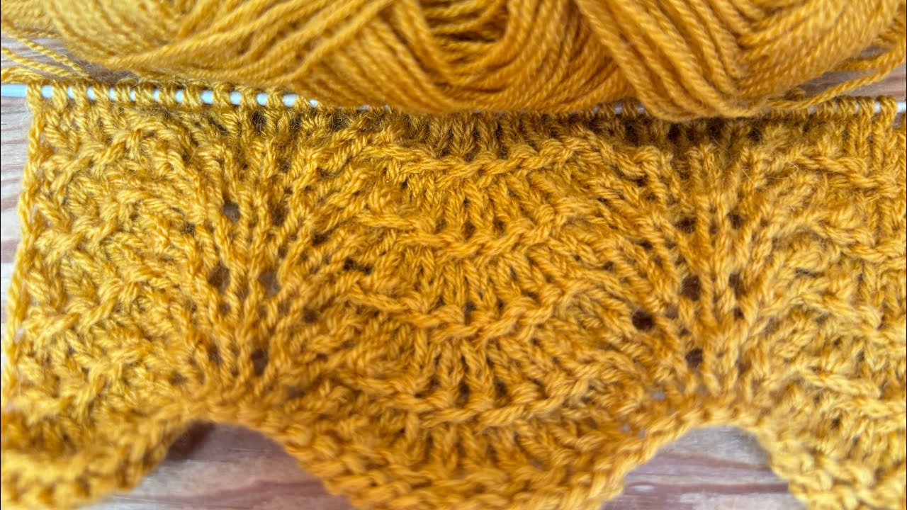 Узор павлиний хвост спицами. 