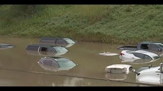 Drivers trapped in floodwaters