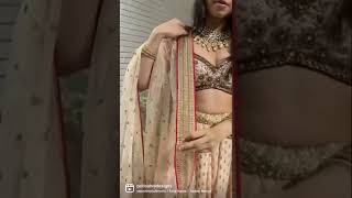 Powder Pink Bridal Lehenga set with zardozi and sequin hand embroidery and red accent