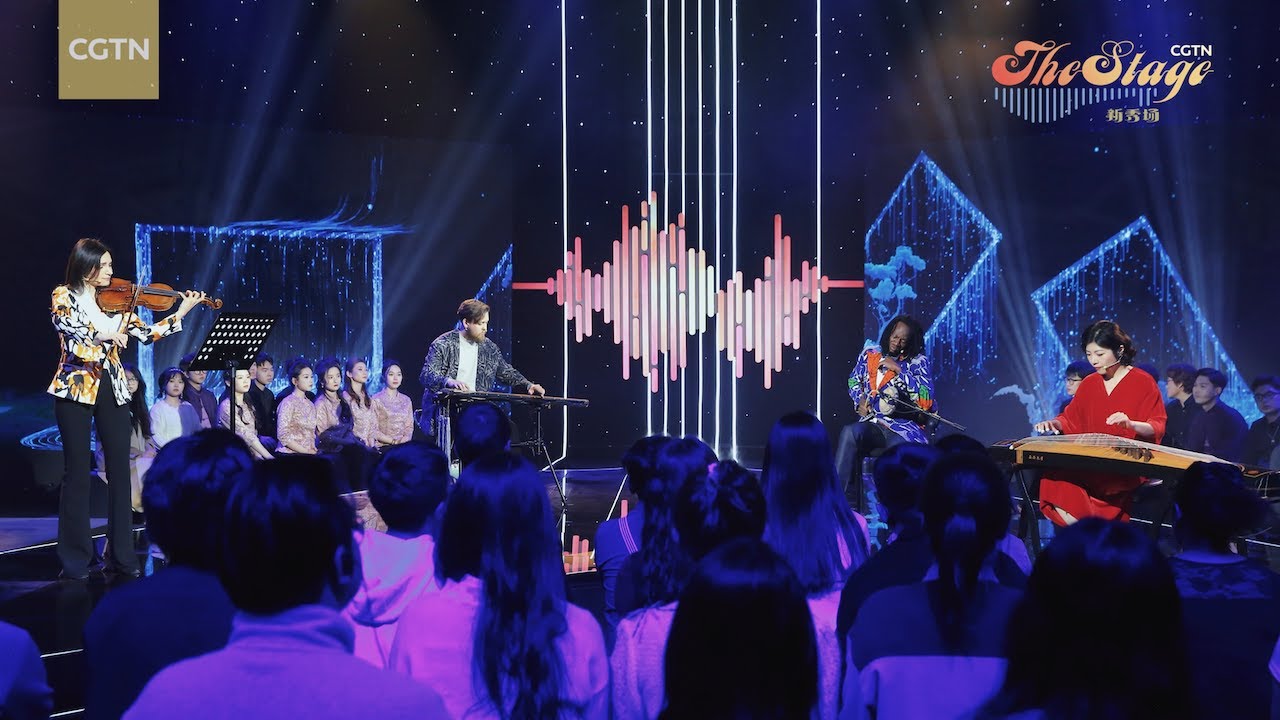 Young international musicians perform "Colorful Clouds Chasing the Moon"