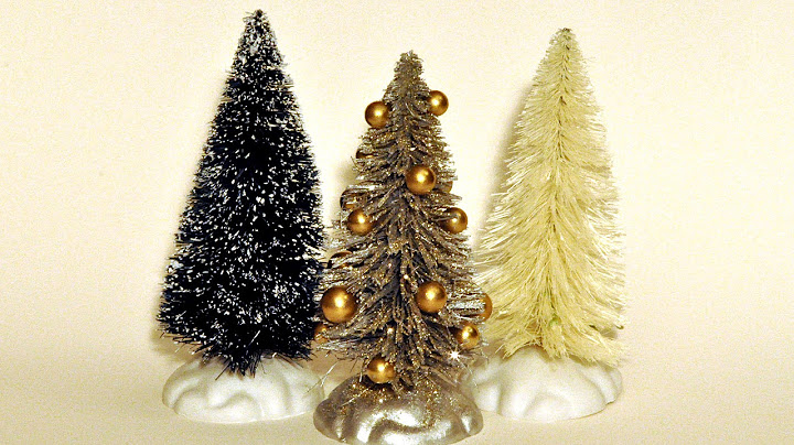 Decorating a bottle brush Christmas tree