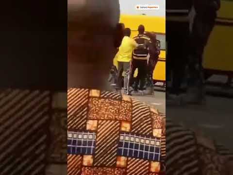  Mild Drama As Two Armed Policemen Exchange Blows In Oshodi, Lagos