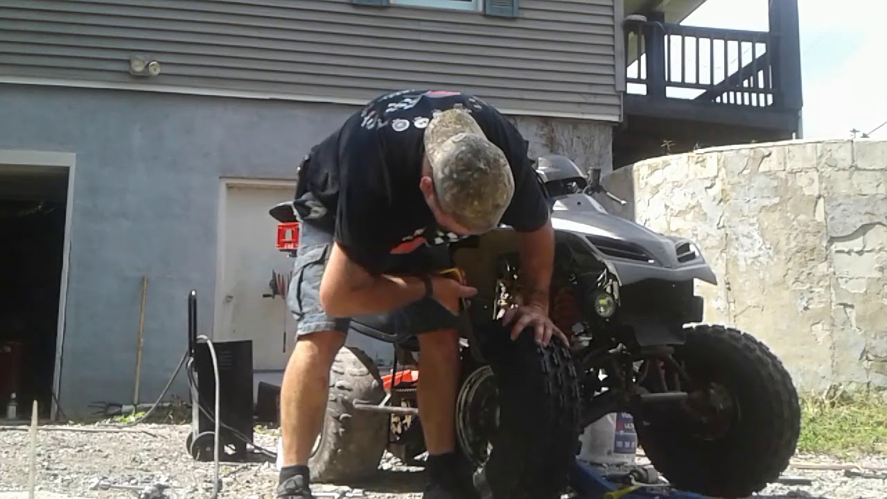 Atv tire breakdown and change with starting fluid mount trick YouTube