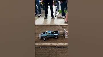 RC tractor pulling with a chevy truck at King of Spring II