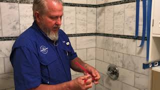 installing shower corner shelf