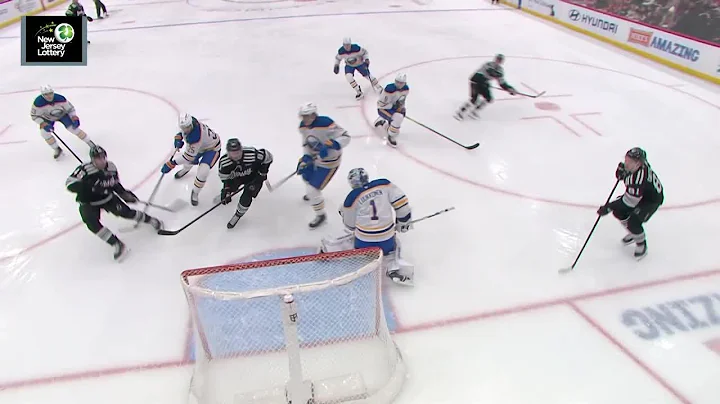 Jack Hughes scores a goal against the Buffalo Sabres