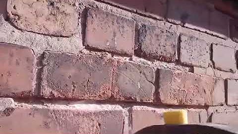 poor example of cement pointing over a lime built building