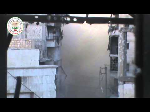 حلب الاشرفية 2013 12 27 تفجير المبنى باللغم في احد المباني الذي يتمركز بها النظام