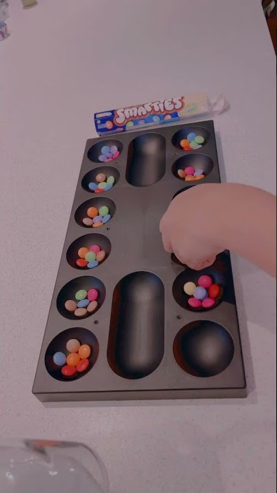 Asmr. Smarties Kalaha game? 🤔 #satisfying #shorts #asmr #viral #trending #youtubeshorts #smarties