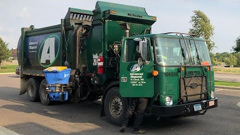 Old Advanced Disposal Waste Management Side Loader Garbage Trucks in Minnesota 