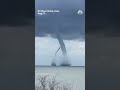 Video shows the moment two waterspouts merged off of Italy's north-eastern coast