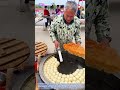 Sizzling Skillet Magic: How Street Cooks Craft Perfect Pan-Fried Soup Dumplings