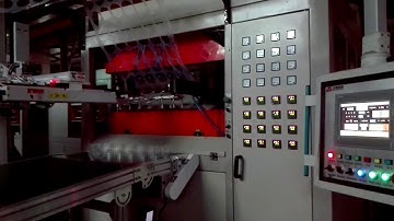 TQC 650B cup thermoforming machine with robot stacker