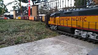 G scale USA trains southern Pacific SD 70 Mac with a union Pacific GP 38 pulling 28 car's