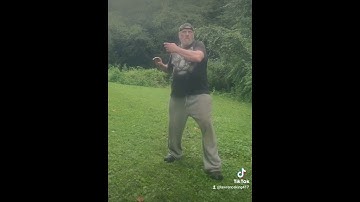 10. BLOCK AND STRIKE AT THE SAME TIME. OVERHEAD KNIFE HAND BLOCK. INWARD KNIFE HAND CHOP TEMPLE/NECK