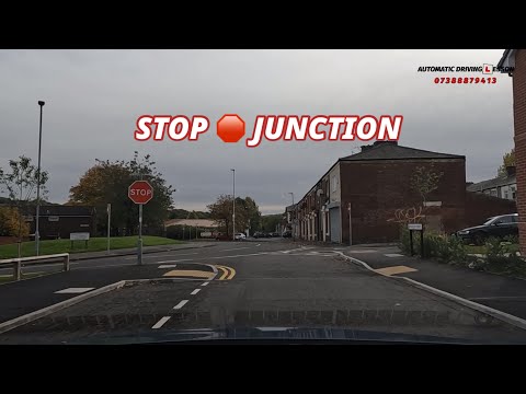 You Arrive At A Junction With Traffic Lights And A Stop Sign What Must You Do
