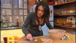 Rachael Ray shows you how to clean a wooden cutting board.