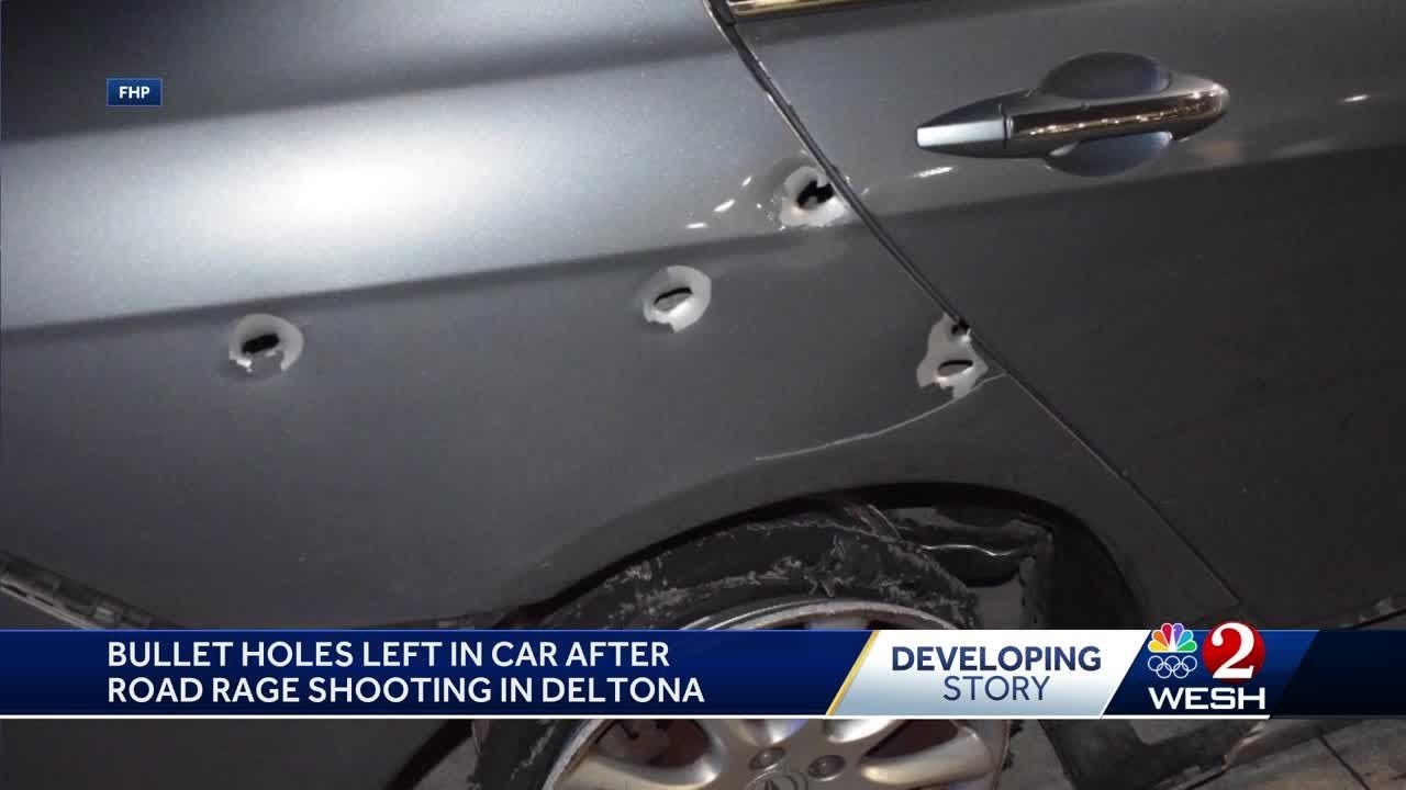 Bullet holes left in car after road rage shooting in Deltona - YouTube