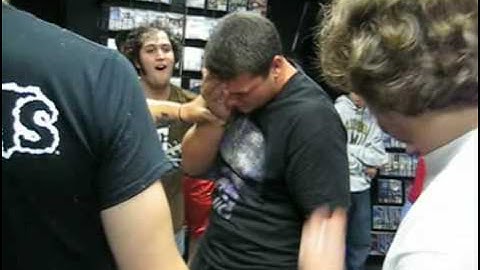 Guitarist hits crowd member in the face Video