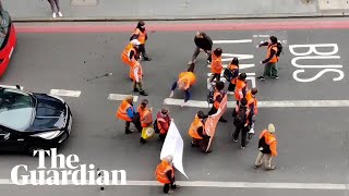 Man attacks Just Stop Oil protesters obstructing London road