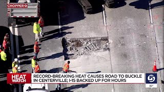 Record breaking temperatures cause road to buckle in Centerville, I-15 backed up for hours