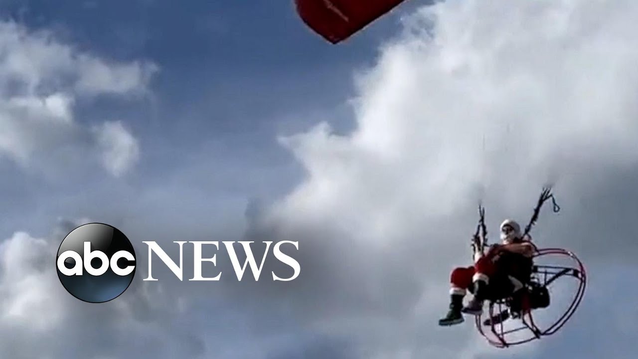 Santa visits Florida beach with powered parachute l GMA