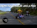 How To Wheelie like A Pro with Polo King | MrBizness