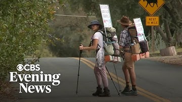 Couple walking through every U.S. state aims to find common ground among Americans