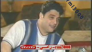 حميد الشاعري وزوجته وابنه  1997