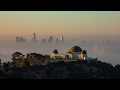 Amazing sunrise above griffith observatory and marine layer
