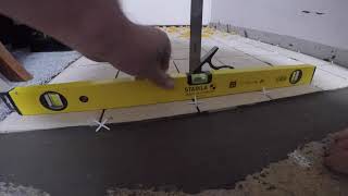 Laying Floor tiles using the self levelling system