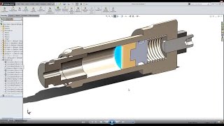 How do you animate a spring compressing in SOLIDWORKS?