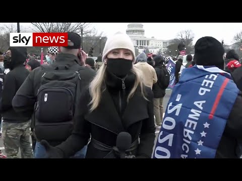 BREAKING: Protesters wearing body armour and helmets scale the walls of the Capitol.