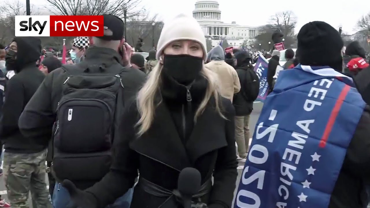 Protesters wearing body armour and helmets scale the of Capitol - YouTube