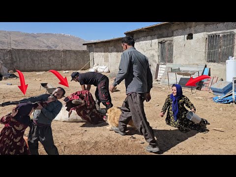 Leila and Shahin are bringing the door to the house and crossing the high and dangerous stairs.