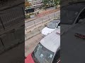 when twins white Tesla was driving on a Hong Kong Highway