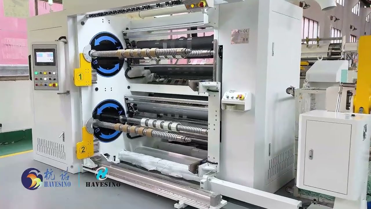 HN1300T Turret Slitter – Robotic Unloading Arm Next-level automation.