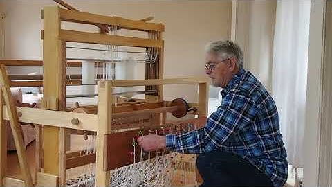 Tying up a Henderson floor loom