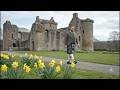 Scotsman Walking Wearing Kilt On Spring History Visit To Aberdour Castle Fife Scotland